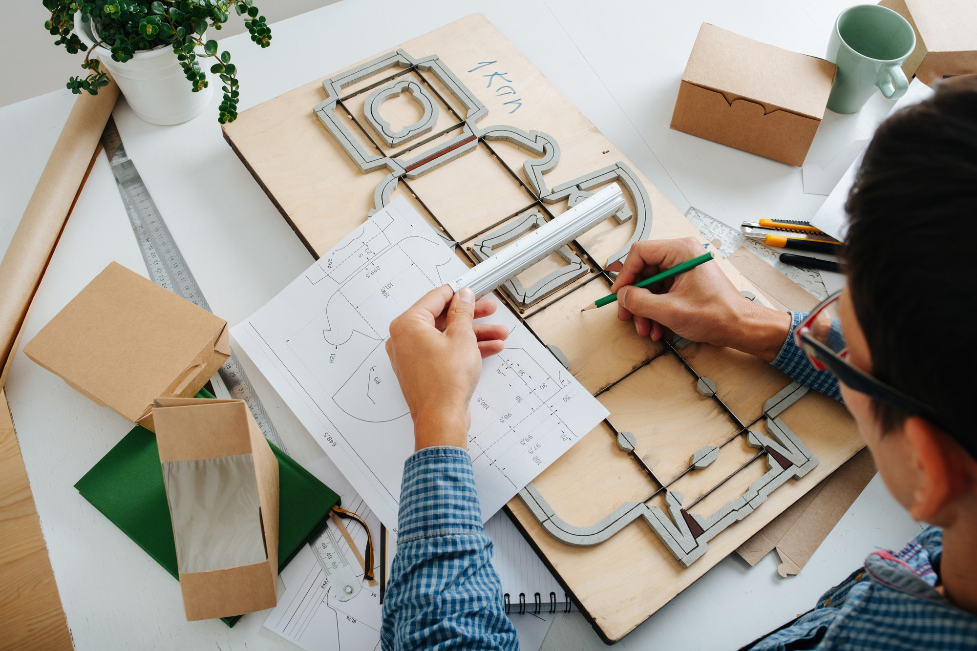 Man Work With Drawings Readymade Boxes Punching Platen