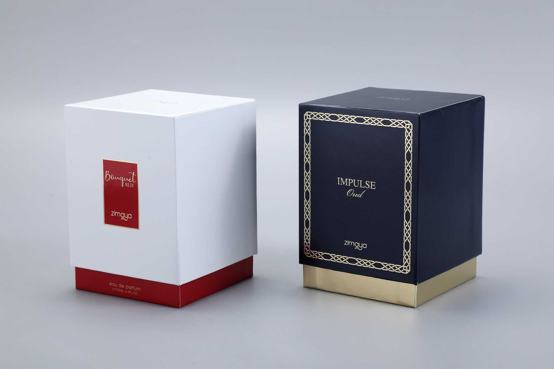 We manufacture custom box packaging for a variety of products. The image showcases two rectangular perfume boxes: one with a light-colored theme featuring contrasting accents, and the other with a deep-colored theme complemented by elegant detailing.